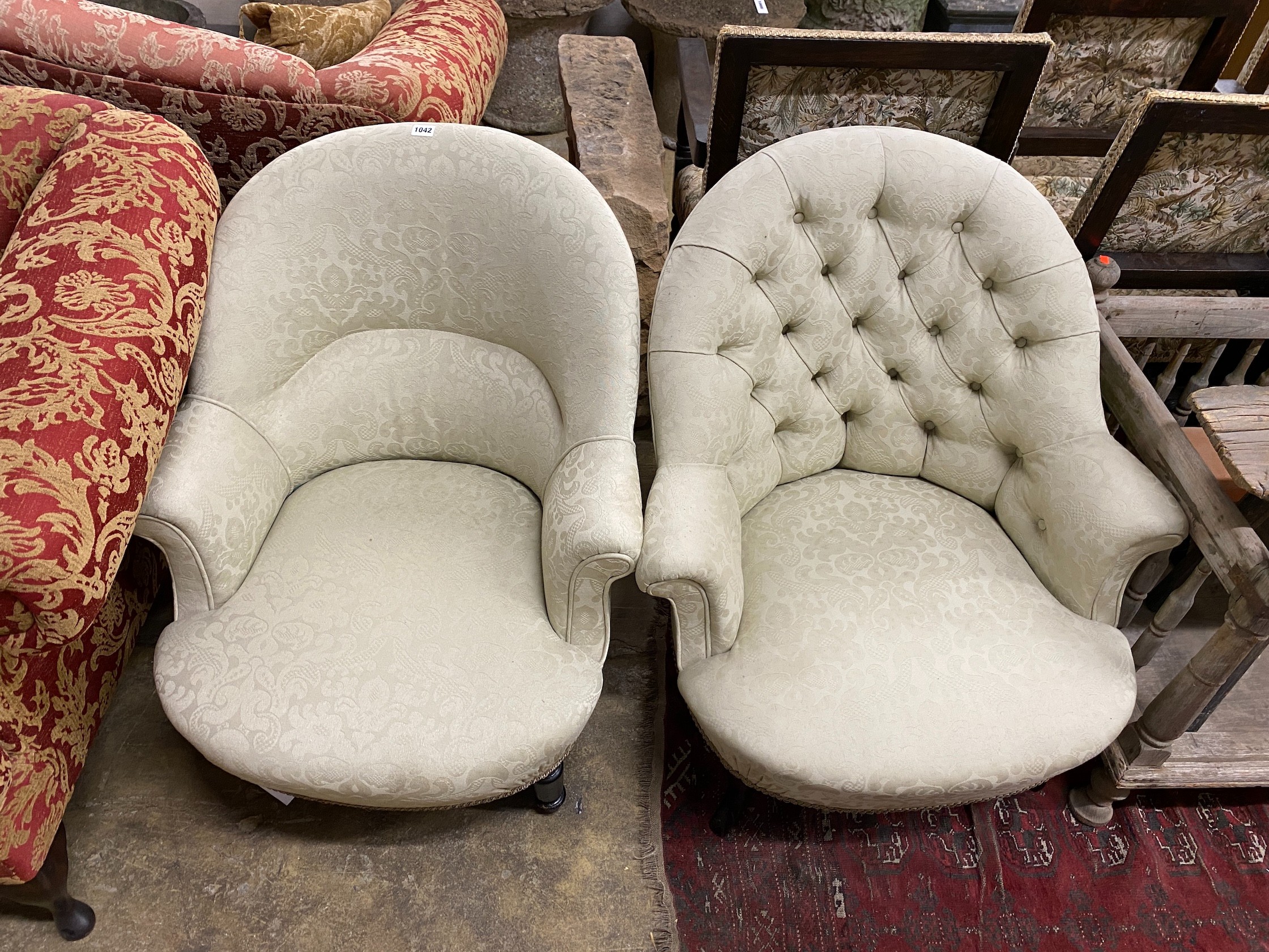 Two late Victorian ebonised tub framed chairs with natural fabric loose covers